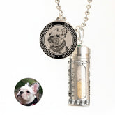 Pet urn necklace with a circular pendant featuring a dog's portrait on a white background.