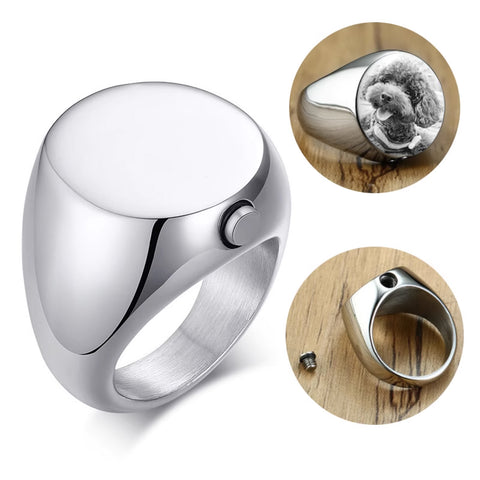 Silver ring with a bottle opener feature on a white background