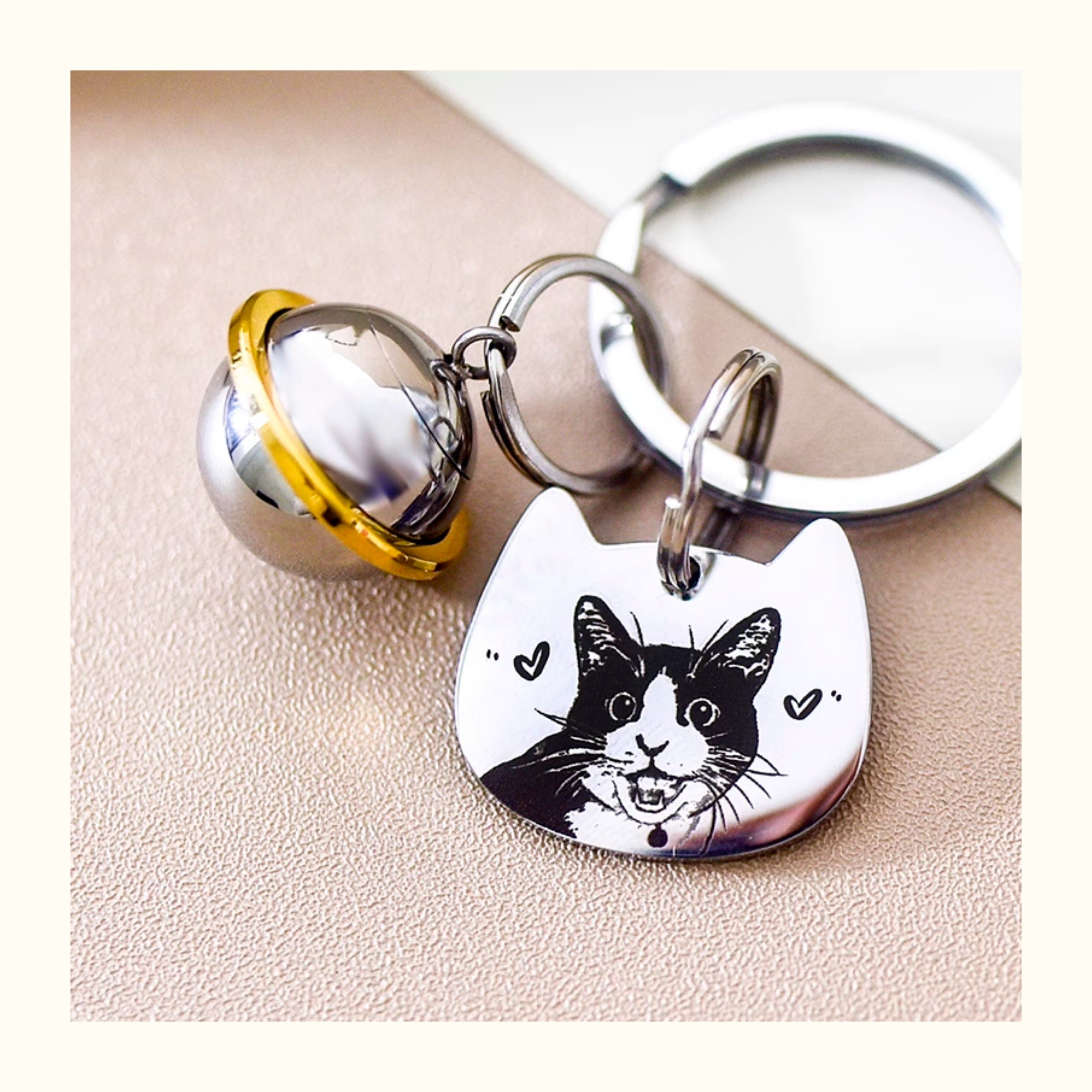 Keychain with a cat design on a beige surface