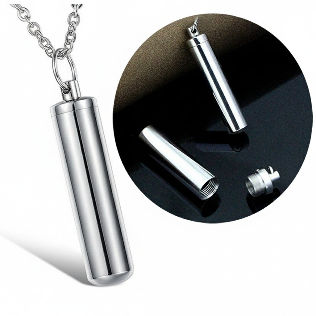 Silver cylindrical pendant on a chain with close-up inset on a black background