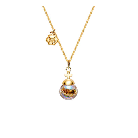 Gold necklace with a colorful pendant on a white background