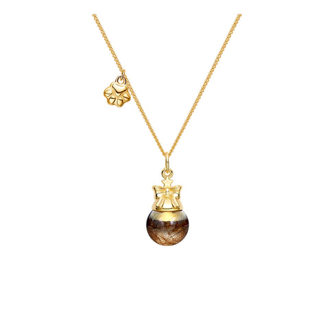 Gold necklace with a pendant on a white background