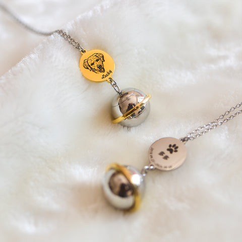 Necklace with two pendants on a textured white surface