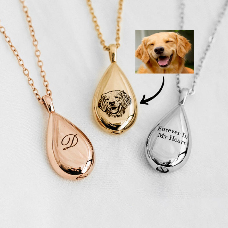 Three teardrop-shaped pendants in rose gold, gold, and silver on a white background with a dog photo inset.