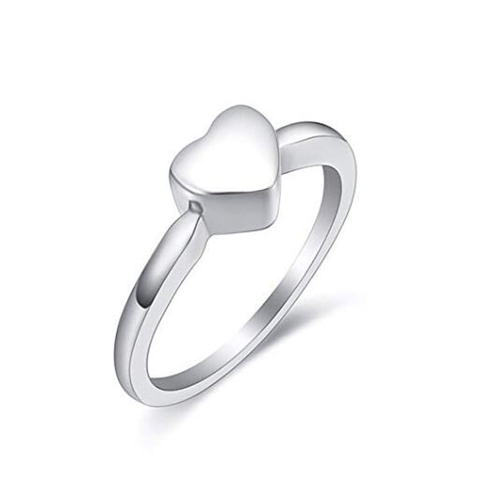 Silver heart-shaped ring on a white background