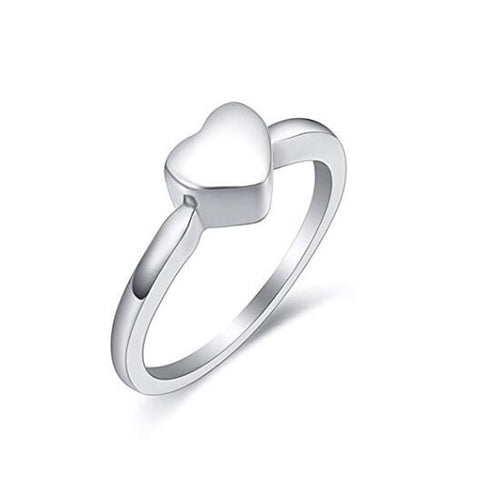 Silver heart-shaped ring on a white background